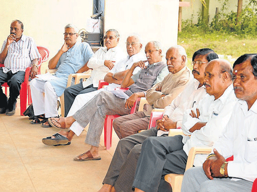 Writers and activists during the meeting convened at Nrupatunga Kannada School, in Mysuru, on Sunday. DH photo