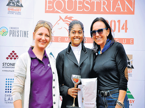 ALL SMILES Tanishka Khataokar (centre), winner of the EPL Junior category with Lina Virwani (left, Chairman of Embassy Group) and Silva Storay (Director of EIRS) on Sunday.