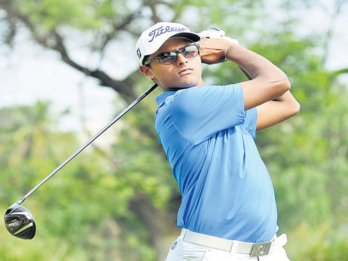 Viraj Madappa tees off during the opening round of the All-India Amateur Championship on Tuesday. DH PHOTO