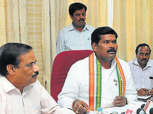Minor Irrigation Minister Shivaraj S Tangadagi chairs a meeting in Mangaluru on Wednesday. DH photo