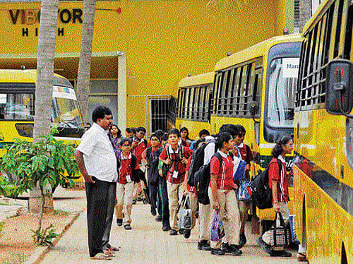 After giving adequate time to make school buses safer for schoolchildren, the State transport department has started cracking its whip against those failing to implement the safety measures. DH file photo