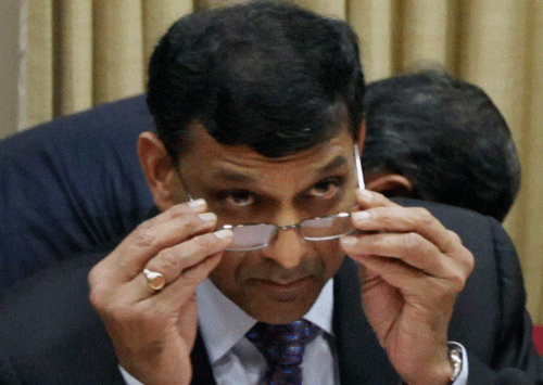 Taking bank lottery scam to a new level, scamsters are using the name and picture of RBI chief Raghuram Rajan to lure gullible people into making a cash deposit. PTI  File Photo For Representation
