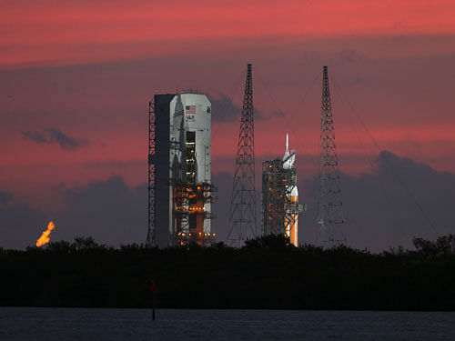 The Orion spacecraft, designed to carry humans farther in deep space than ever before, is poised to blast off today in what NASA hailed as a first step in mankind's journey to Mars.Reuters File Photo