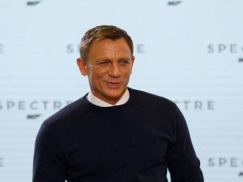 Actor Daniel Craig poses on stage during an event to mark the start of production for the new James Bond film 'Spectre' at Pinewood Studios. Reuters photo