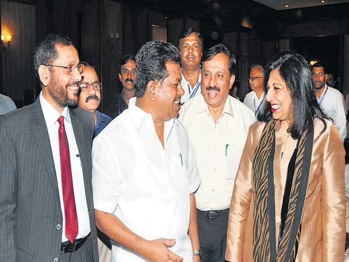 Labour Department Additional Chief Secretary P B Ramamurthy, Labour Minister P T Parameshwara Naik, Biocon Chairperson Kiran Mazumdar-Shaw and Karnataka State Safety Institute (KSSI) Secretary B S Ramachandra at the seminar on 'Prevention of Industrial, Chemical Disasters in Pharmaceutical and Fine Chemical Industries' on the occasion of Chemical Disaster Prevention Day 2014 organised by KSSI&#8200;in Bengaluru on Thursday. DH Photo