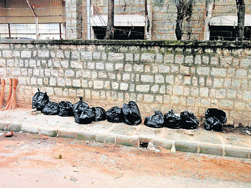 Garbage packed in polythene covers after cleaning the street.