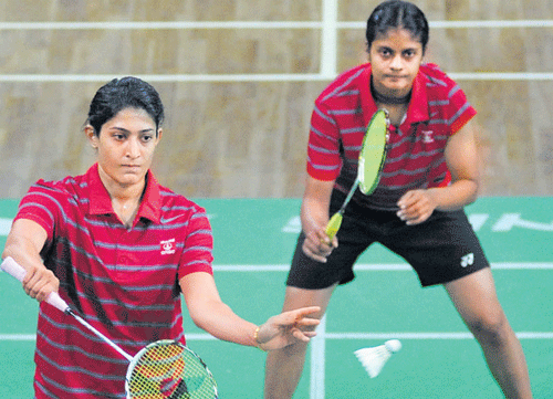 FOCUSED ONGC's Ashwini Ponnappa (front) and PC Thulasi  in action in women's doubles final on Friday. DH PHOTO