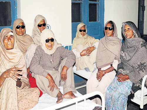 Patients who lost their vision after undergoing botched eye surgeries at  hospital in Amritsar on Friday. PTI