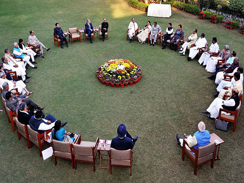 Prime Minister Narendra Modi with Chief Ministers and Governors of various states at the retreat at Race Course Road, following the meeting on Planning Commission revamp, in New Delhi on Sunday. PTI Photo
