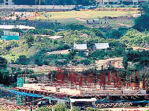 A picture taken in September of the constructionwork on the Bellandur-Agara lake bed. DH PHOTO