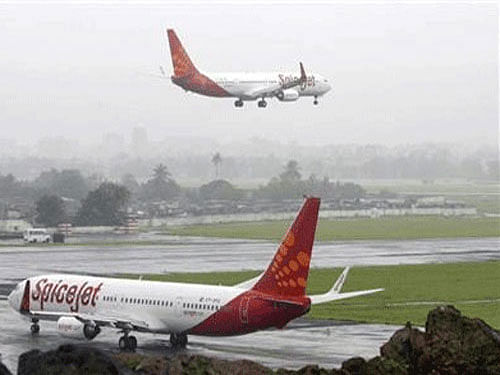 Cash-strapped airline SpiceJet may end up cancelling over 1,850 flights, including 302 from Bengaluru, this month as it is withdrawing services as part of its  restructuring  plans. Reuters file photo