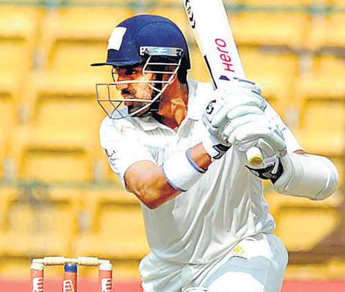 Karnataka's Robin Uthappa sends one to the fence during his knock of 76 against TN in their Ranji Trophy clash on Tuesday. DH PHOTO/ KISHOR KUMAL BOLAR