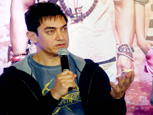 With just 9 days left for the release of 'PK', Aamir takes to Twitter to garner attention of his fans and movie buffs. PTI photo