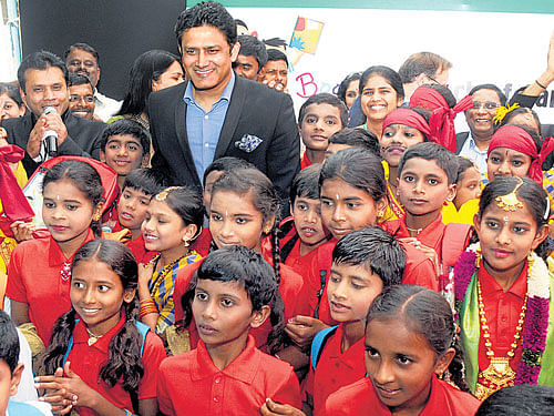Former cricketer Anil Kumble interacts with children at the launch of 'Books,My Friends' campaign, organised by Child Fund India, a child development organisation, in the City onWednesday. DH PHOTO