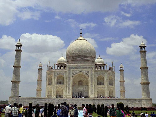 A team of researchers from India and the US has found that the browning of the Taj Mahal's iconic marble dome and soaring minarets is due to dust and airborne carbon particles. PTI file photo