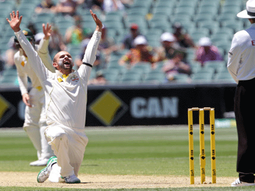 Australia off-spinner Nathan Lyon today said he will look to exploit the footmarks created by Indian pacer Ishant Sharma during his spell to David Warner on the opening day of the first cricket Test. AP Photo