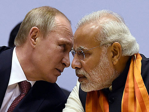 Prime Minister Narendra Modi and Russian President Vladimir Putin during the World Diamond Conference in New Delhi on Thursday. PTI Photo