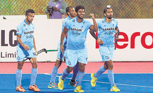 SKUthappa (centre) has been a keymember of the Indian forwardline at the Champions Trophy. AFP