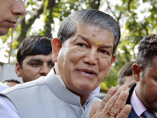 Uttarkhand Chief Minister Harish Rawat today criticised the move to dismantle Planning Commission saying it has created uncertainty in the country, a view countered by Maharashtra CM Devendra Fadnavis who claimed the new framework will give more rights to states. PTI photo
