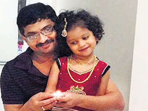 Vishwakant with his daughter in Sydney. PTI Photo