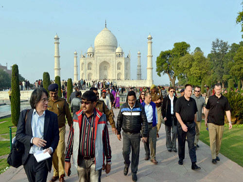 Officials along with security personnel carry out inspection at the Taj Mahal premises ahead of the US President Barack Obama's January visit in Agra. PTI photo