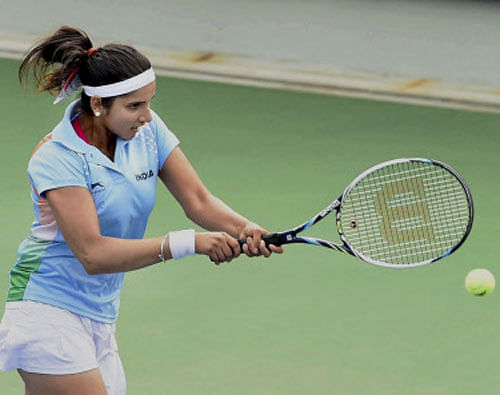 Sania Mirza grabbed her third mixed doubles Grand Slam title and wrapped up her dream season with the year-end finale trophy even as India's established male tennis players found the going tough in 2014. PTI file photo