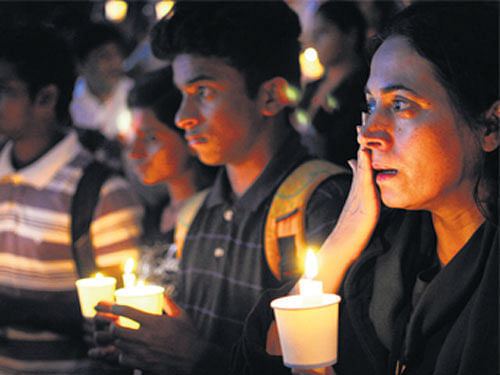 A candlelight vigil was organised in Bengaluru on Thursday to condemn the attack on the Army Public School at  Peshawar in Pakistan that took the lives of 148. dh photo