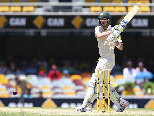 Steven Smith led the way with a magnificent century on his captaincy debut while Mitchell Johnson and Mitchell Starc struck counter-attacking fifties as Australia gained a 95-run first-innings lead over India in the second cricket Test here today. AP photo