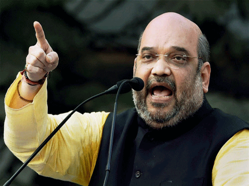 BJP President Amit Shah today claimed that the Narendra Modi government has succeeded in containing inflation and strengthening the economy of the country. PTI file photo