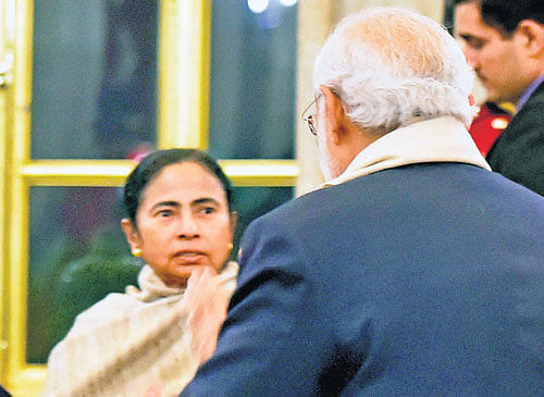 Prime Minister Narendra Modi and West Bengal Chief Minister Mamata Banerjee exchanged pleasantries on Friday night-for the first time since the BJP government came to power last May. PTI file photo