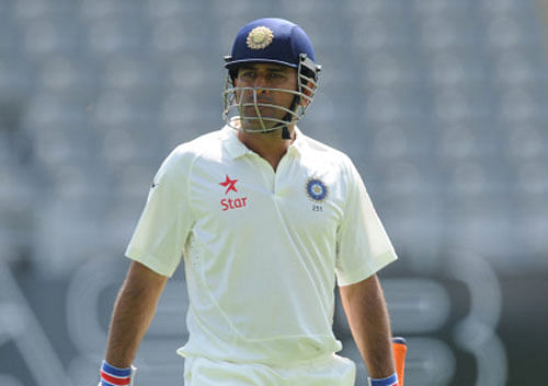 Indian cricket captain Mahendra Singh Dhoni feels 50-50 decisions are going against his team in the ongoing Test series against Australia but remains adamant that having the controversial Decision Review System would not have helped. AP file photo