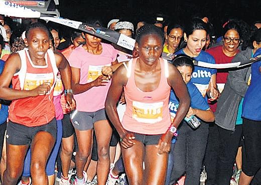 colourful (Top)&#8200;Participants in the women's 10K run. (Below) Competitors from all walks of life at the event. dh photos