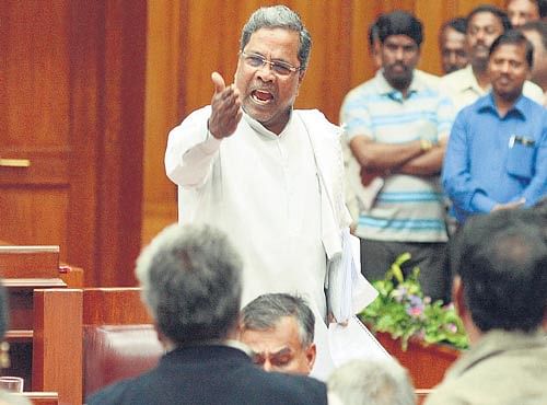on the offensive: Chief Minister Siddaramaiah gestures while replying to a discussion on the development of North Karnataka, in the Assembly during the legislature session in Belagavi on Saturday.  DH Photo