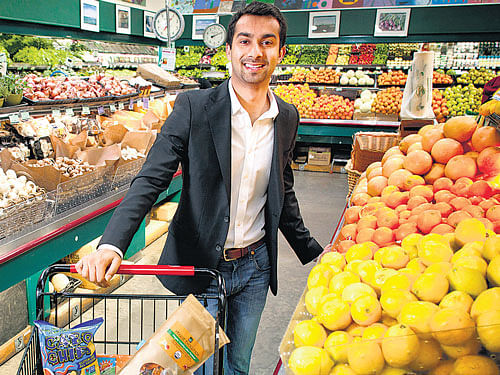 Apoorva Mehta, founder of Instacart, a service that summons a personal shopper through an app to pick up your items from a grocery store and deliver them to you, at Rainbow Grocery in San Francisco. INYT