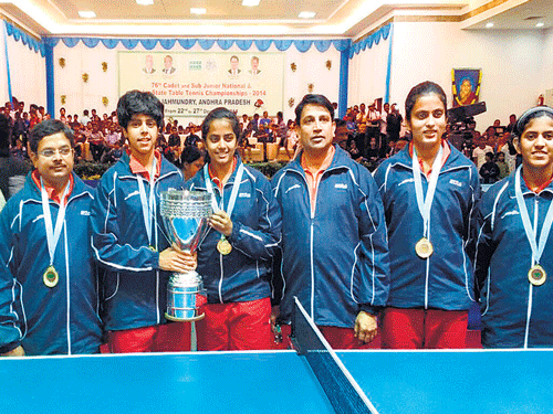 Karnataka girls table tennis team, winners of the Sub-junior national championship in Rajahmundry onWednesday. Fromleft: Vipul Chougule (coach), Archana Kamath, Kushi Viswanath, Vijayasarathi (coach), Medhini Bhat and Gayathri Tanksali