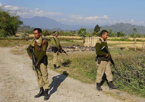 Security personnel patrolling after the attacks by Bodo militants that left several people dead, in Sonitpur on Thursday.PTI Photo