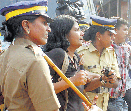 It's interesting to note that the two issues that dominated Kerala's socio-political discourse in 2014 were both anchored in dichotomies of its society. olice arrest people who organised kiss protest called 'Kiss in the Street' in Kozhikode. PTI Photo