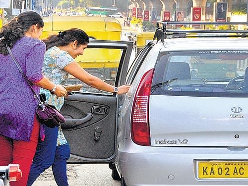 Web-based taxi operators agree  to obtain transport permits