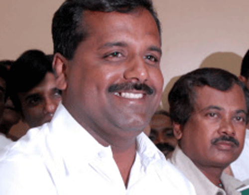 A man allegedly posted a morphed image of Karnataka Health Minister U T Khader on a movie poster on a popular social networking site.DH File Photo