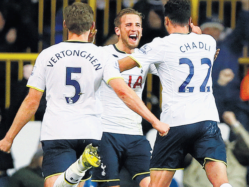 Tottenham players Jan Vertonghen (left) Harry Kane (centre) and Nacer Chadli celebrate Chadli's goal against Chelsea on Thursday. AP