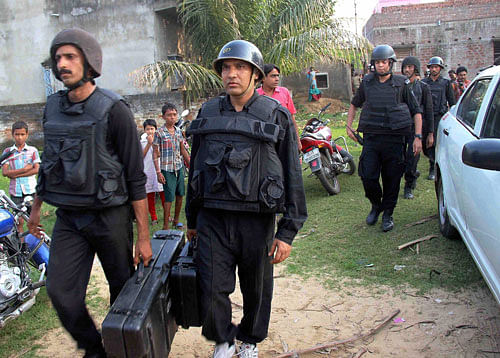 Three persons arrested in Assam for alleged connection with the Burdwan blast case were today remanded in eight days' NIA custody. Photo: PTI (File)