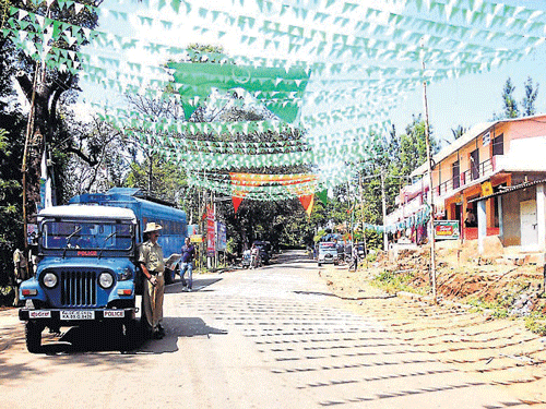 Police security was beefed up following a minor clash during Eid-Milad, at Hosathota, in Somwarpet, on Saturday. dh photo