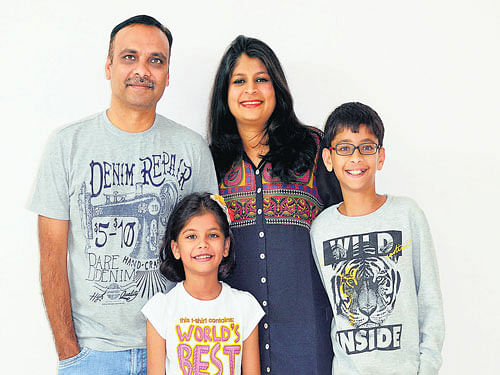 comfortable Rakesh and Rekha with children Aryan and Aarvi.