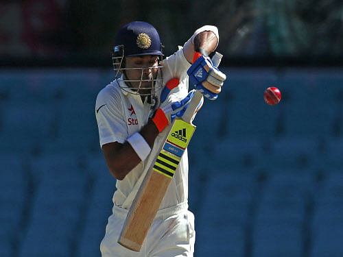 Lokesh Rahul plays a short delivery from Australia's Mitchell Starc during the second day's play in the fourth test at the Sydney Cricket Ground. In reply to Australia's 572 for seven declared in the first innings, India were 71 for one at stumps on the second day of the fourth and final cricket Test at the SCG here today. Reuters photo