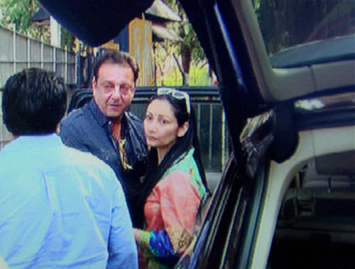 Sanjay Dutt left home for jail to surrender on expiry of his 14-day furlough but was back home again, apparently due to lack of coordination.PTI File Photo