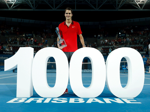 Tennis ace Roger Federer edged past Canadian Milos Raonic to win the Brisbane International title, thereby completing his 1,000th professional career win, here Sunday.AP Photo