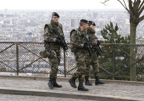 French soldiers patrol around the Sacre Coeur basilica at Montmartre district, in Paris,, Monday, Jan. 12, Photo: AP
