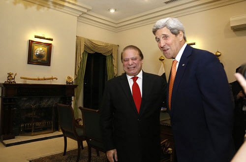 U.S. Secretary of State John Kerry is greeted by Pakistan Prime Minister Nawaz Sharif shortly after arriving in Islamabad, Pakistan Monday, Jan. 12, 2015. Kerry arrived in Pakistan on Monday to press the country's leadership to step up the fight against extremists and eliminate safe havens for terror groups along the Afghan border. Pakistan has been on edge ever since the Dec. 16 attack on the Peshawar school that was claimed by the Pakistani Taliban as retaliation for an army operation launched in June in the North Waziristan tribal area. AP photo