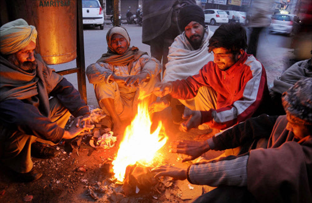 Rain and snow in some places may have ended dry, cold spell, but north India largely continued to shiver under cold conditions with minimum temperature in Delhi recording the lowest in a month and fog affecting visibility early on Tuesday morning.  PTI file photo