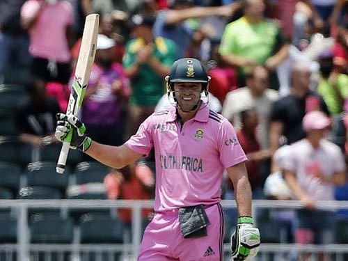 South Africa's captain AB de Villiers celebrates his century during the second One-Day International (ODI) against the West Indies at the Wanderers Stadium in Johannesburg. Reuters photo